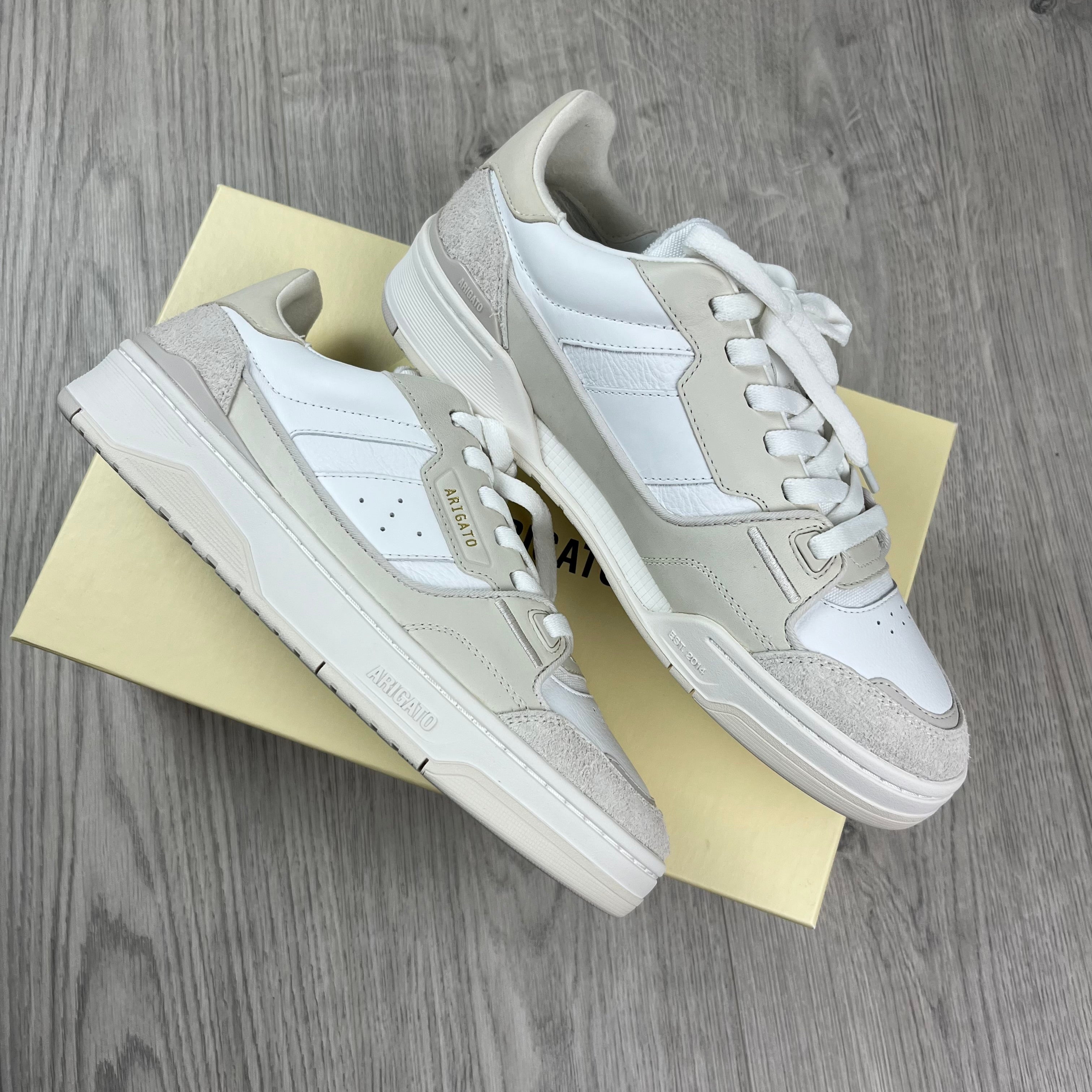 Men's Axel Arigato Clay Sneakers in Beige/White. On sale at Open Attire.