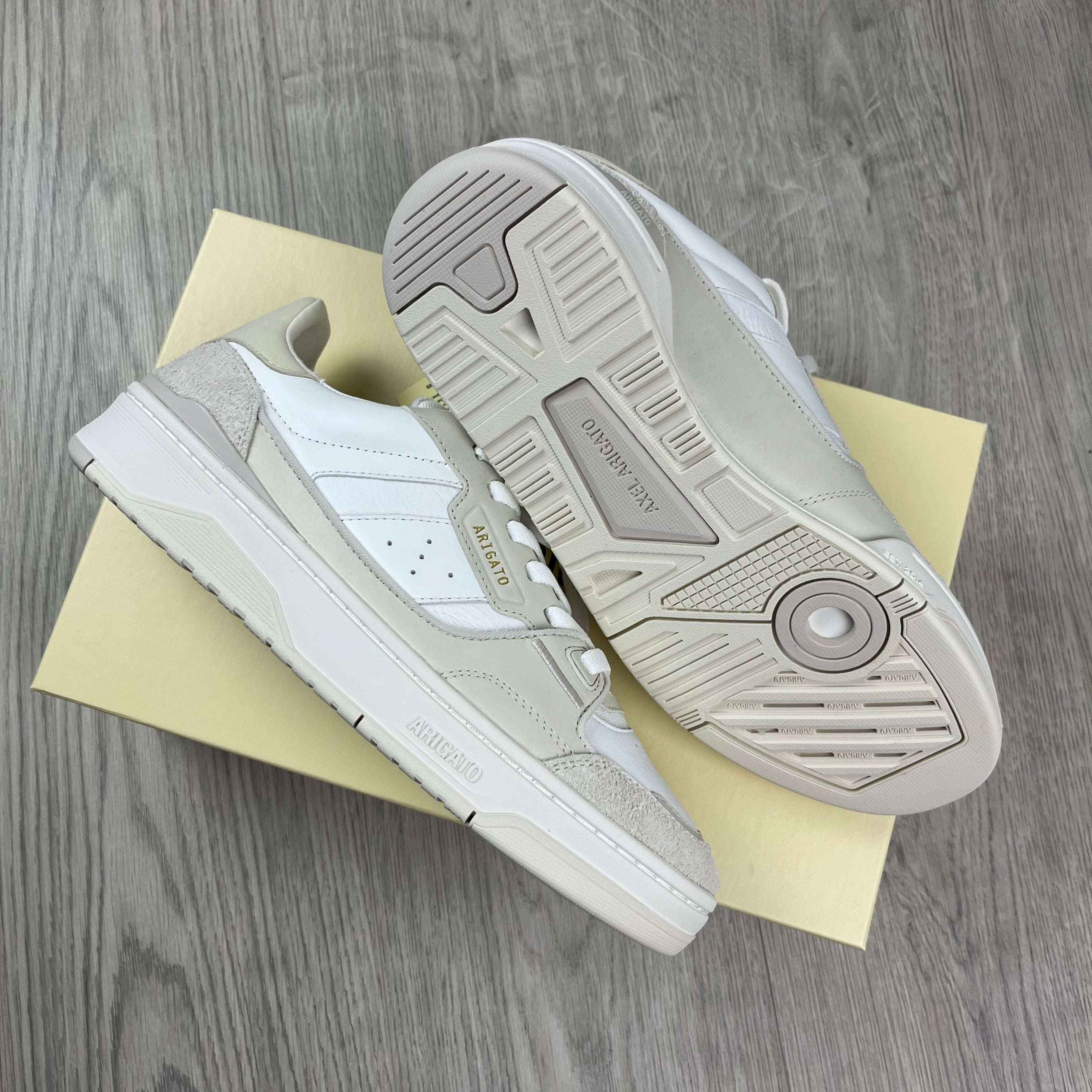 Men's Axel Arigato Clay Sneakers in Beige/White. On sale at Open Attire.