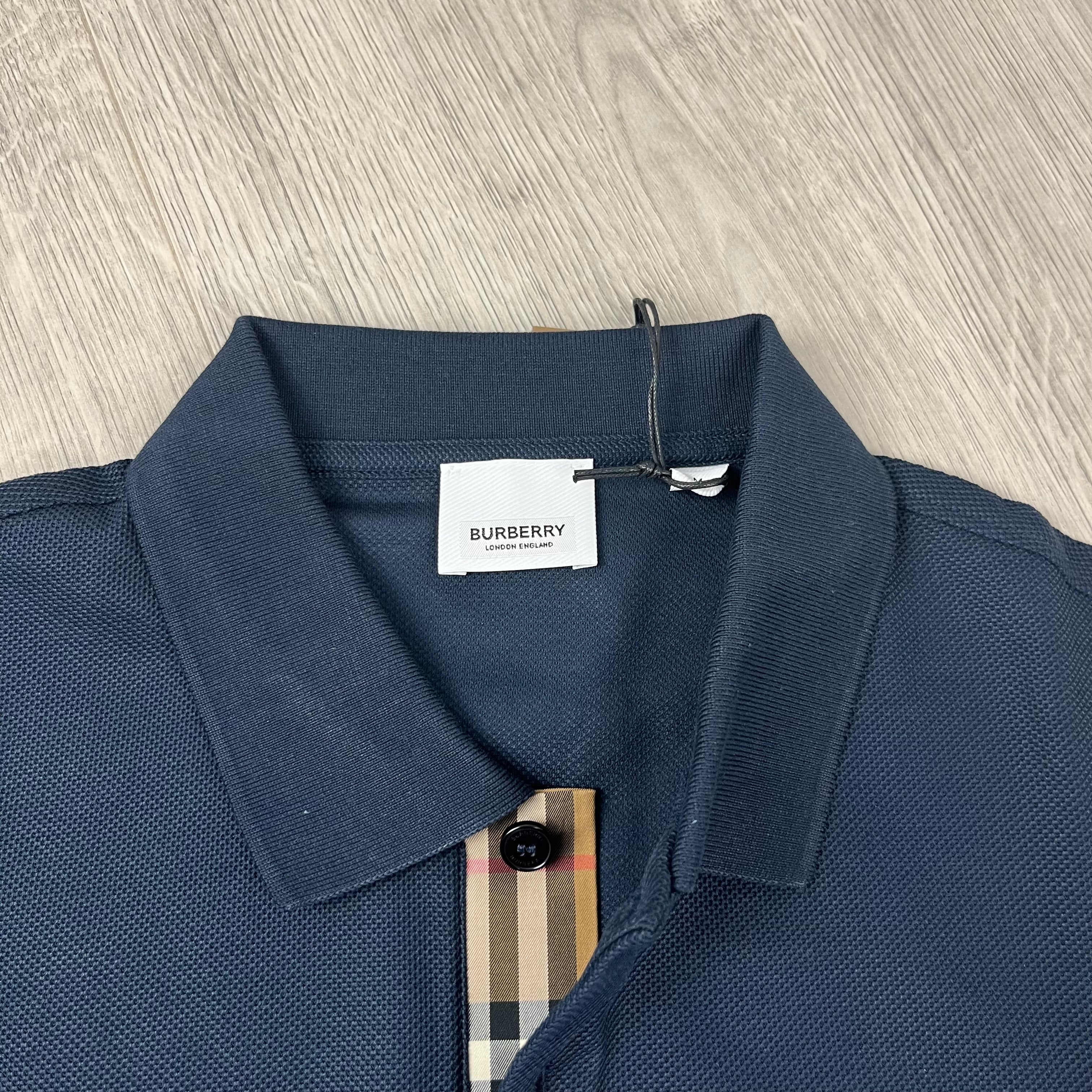 Burberry 'Hartford' Polo Shirt in Navy Blue. On sale at Open Attire.
