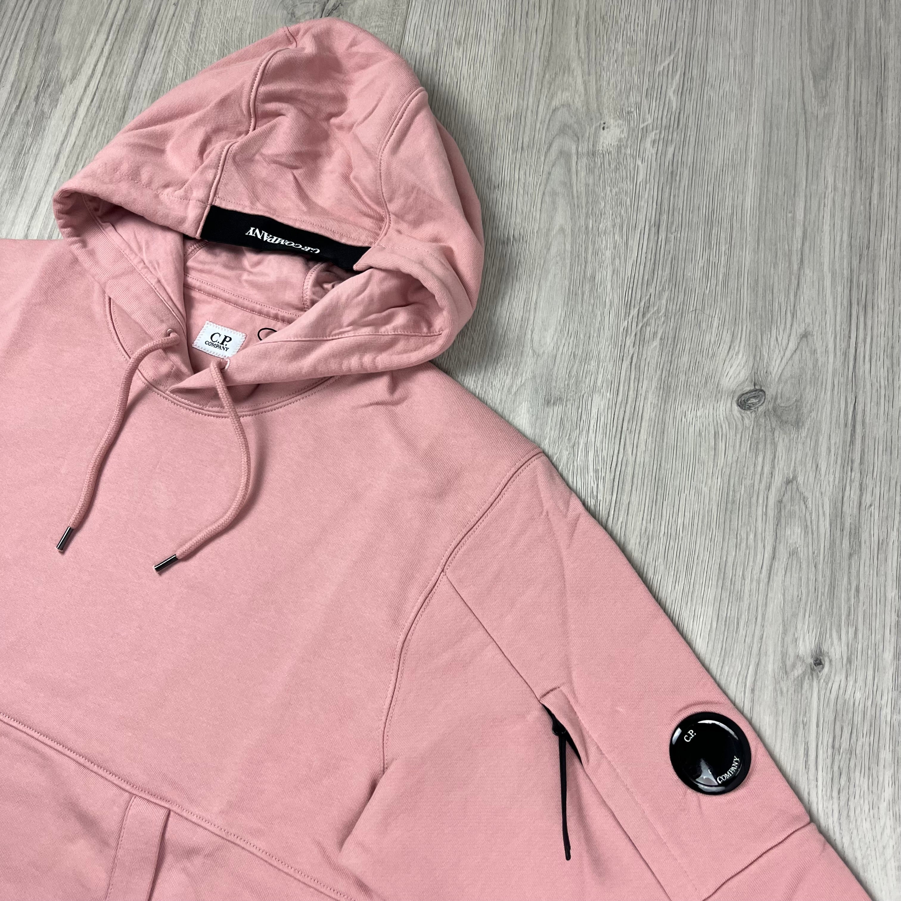 CP Company Diagonal Raised Fleece Hoodie in Misty Rose. On sale at Open Attire.