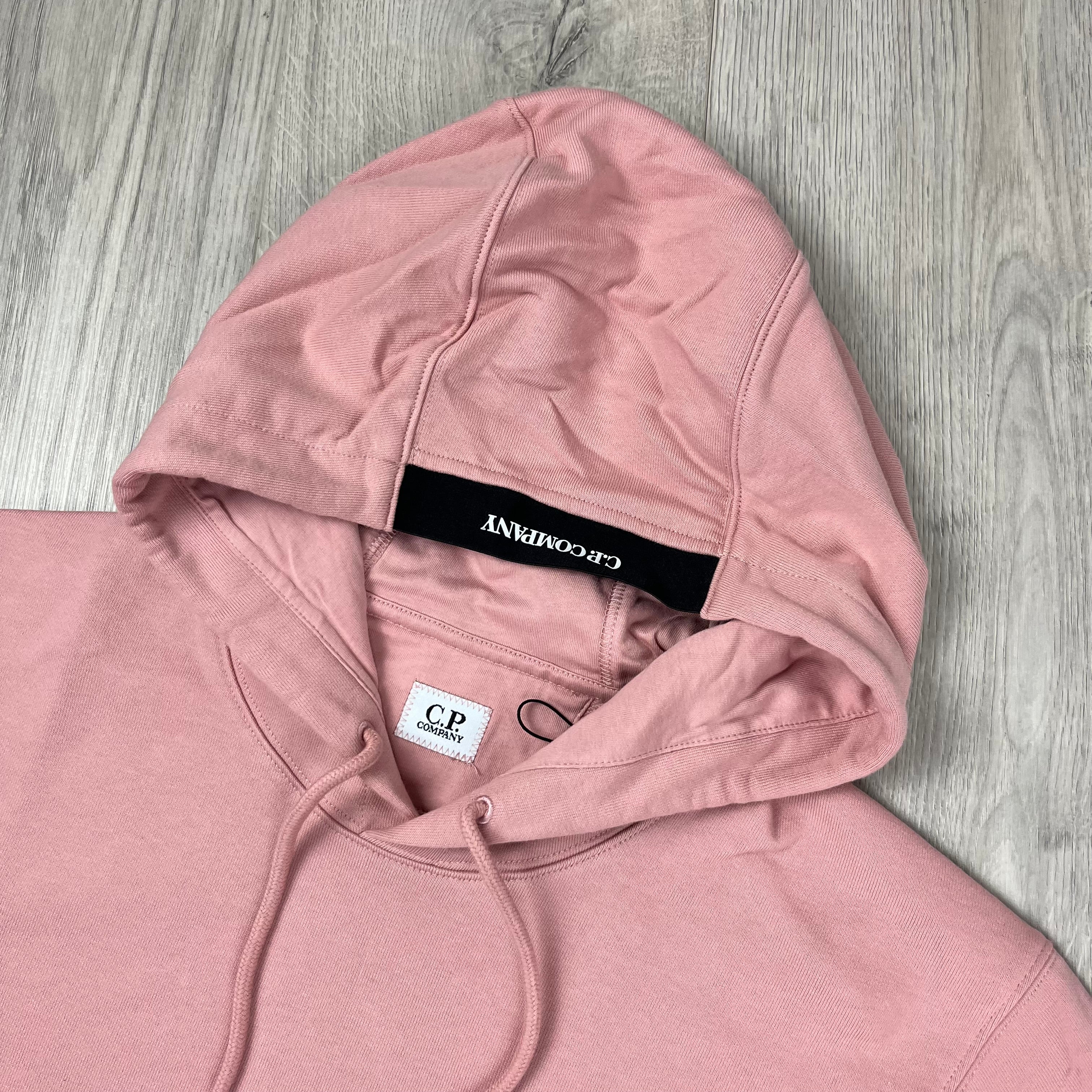 CP Company Diagonal Raised Fleece Hoodie in Misty Rose. On sale at Open Attire.