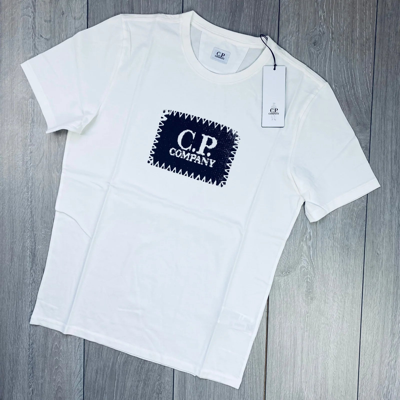 CP Company Stamp T-Shirt in Gauze White. On sale at Open Attire.