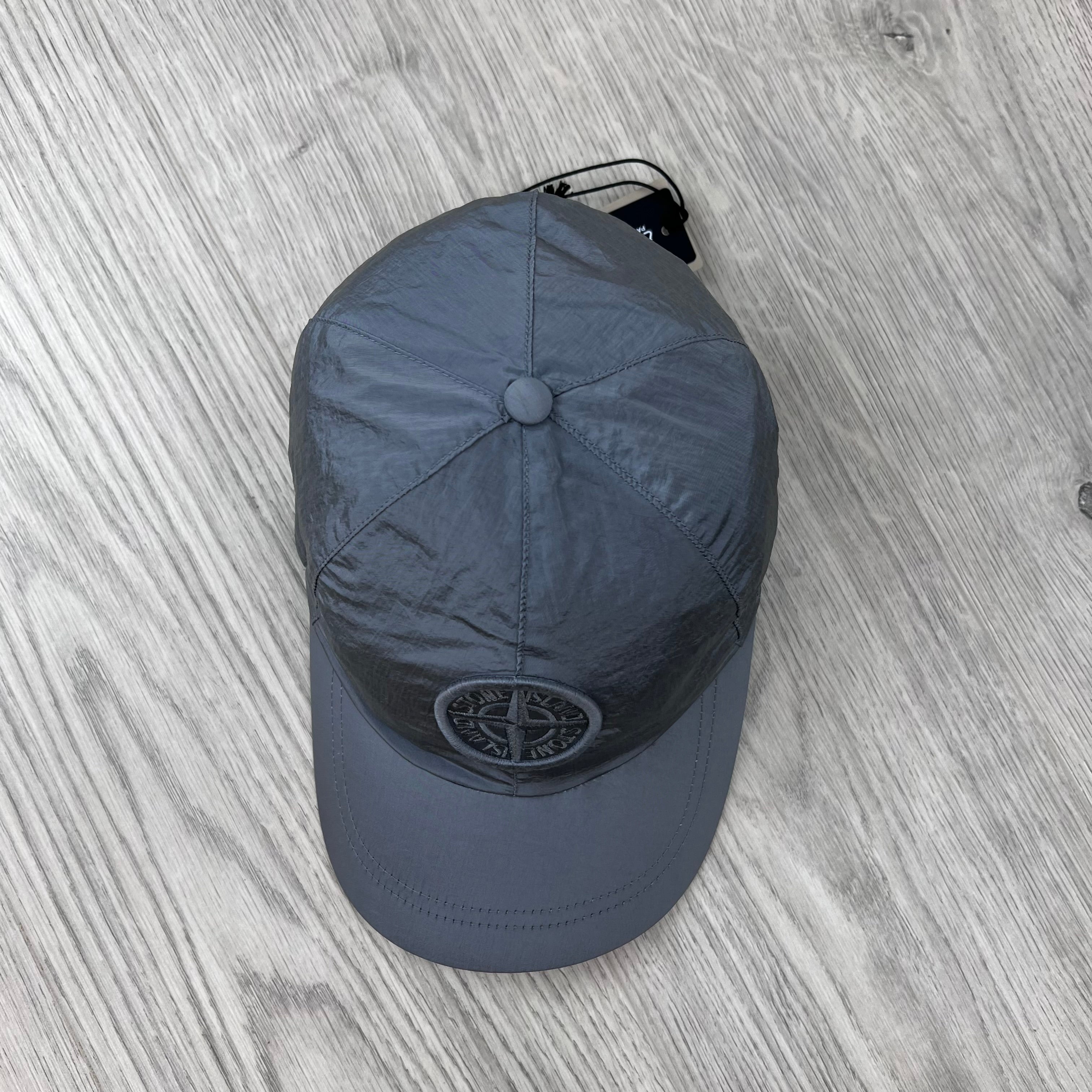 Arial view of the Stone Island Nylon Metal Baseball Cap in Ash Grey.