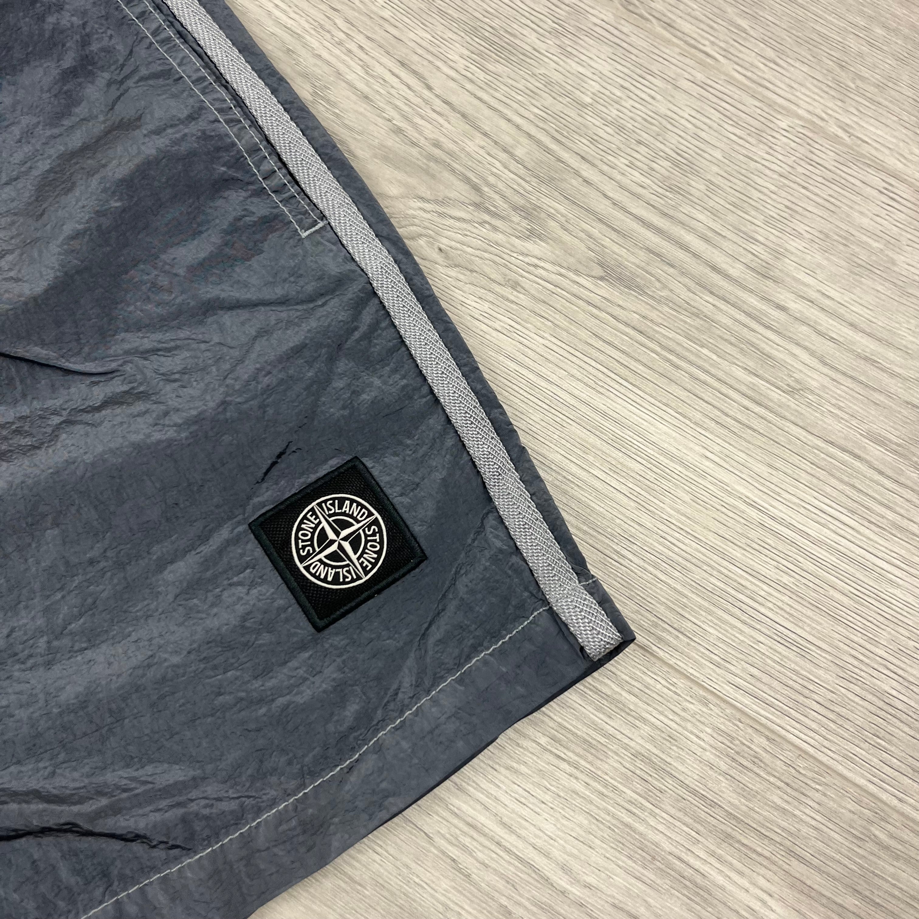 Stone Island Nylon Metal Swim Shorts in Avio Blue. On sale at Open Attire.