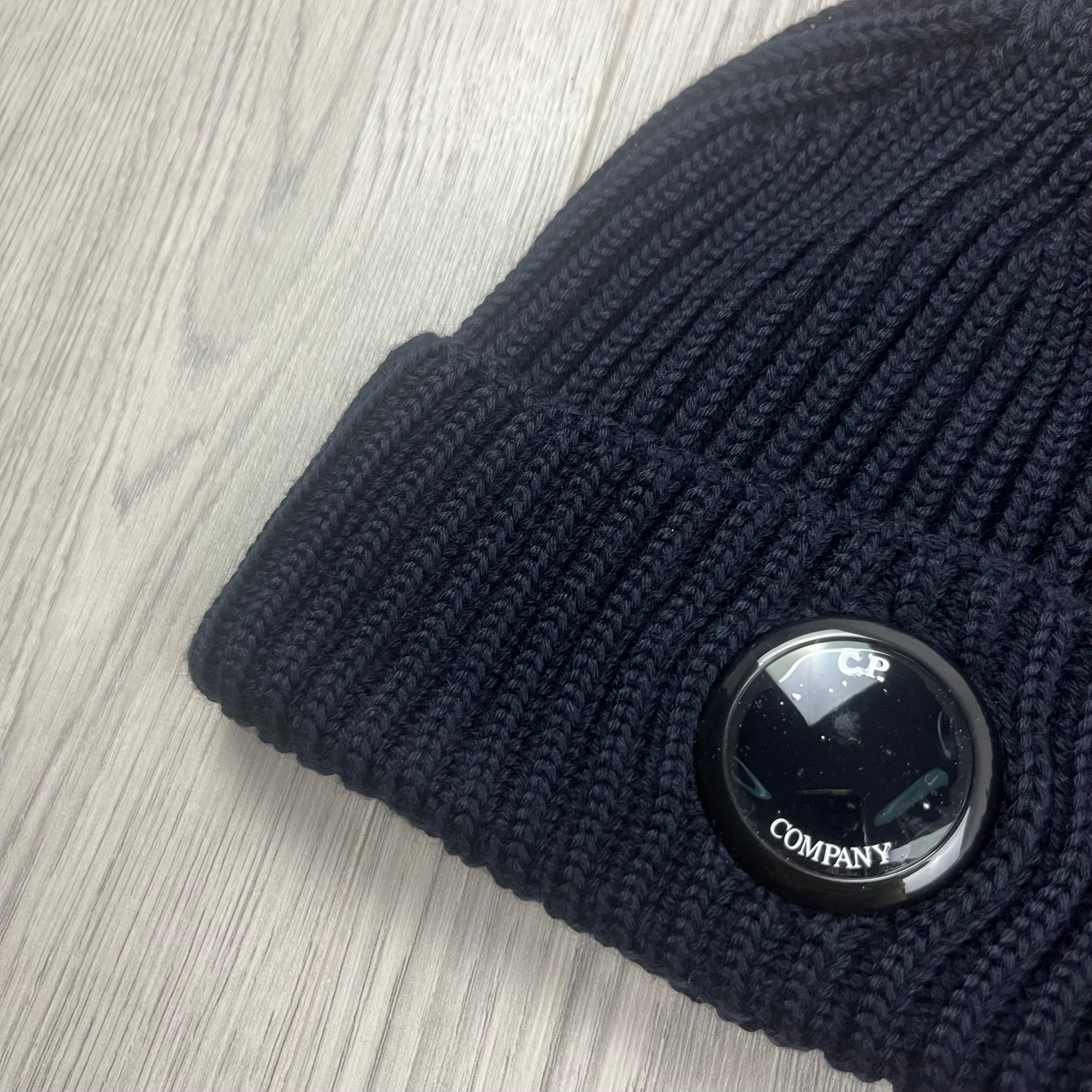 CP Company Merino Wool Lens Beanie in Total Eclipse Navy Blue. On sale at Open Attire.