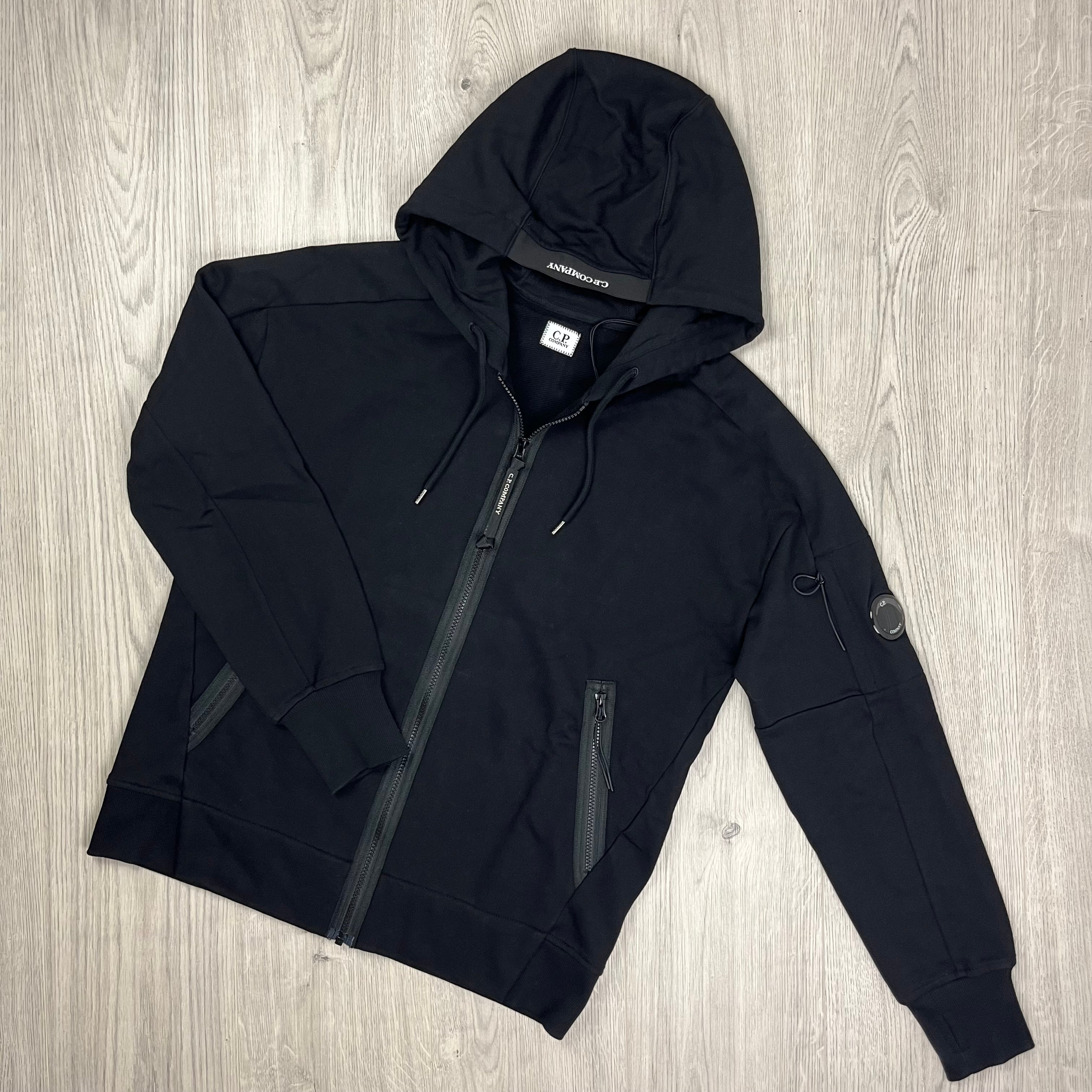 CP Company Black Tracksuit consisting of a hoodie and sweatpants. On sale at Open Attire.