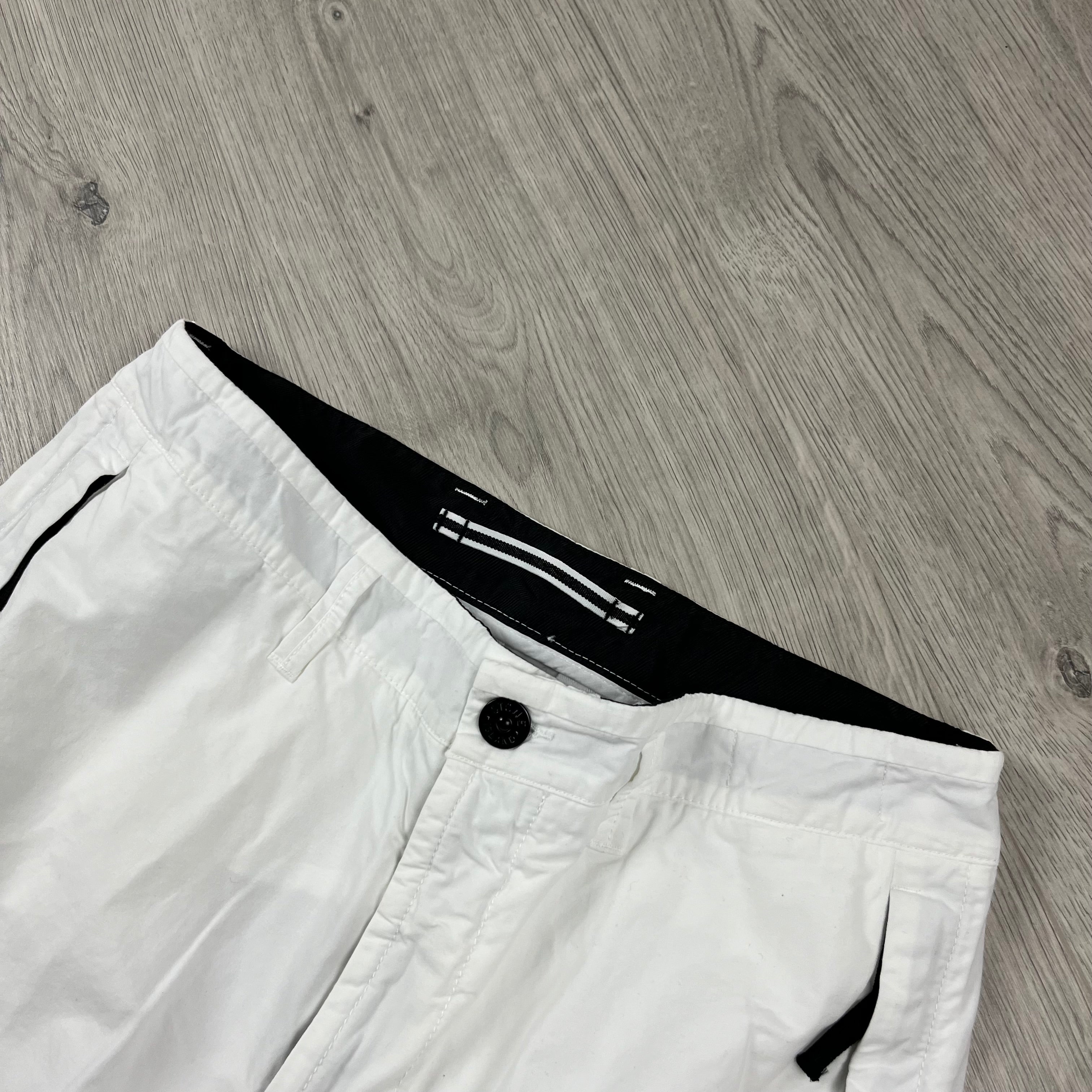 Stone Island 'OLD' treatment cargo trousers in White. On sale at Open Attire.