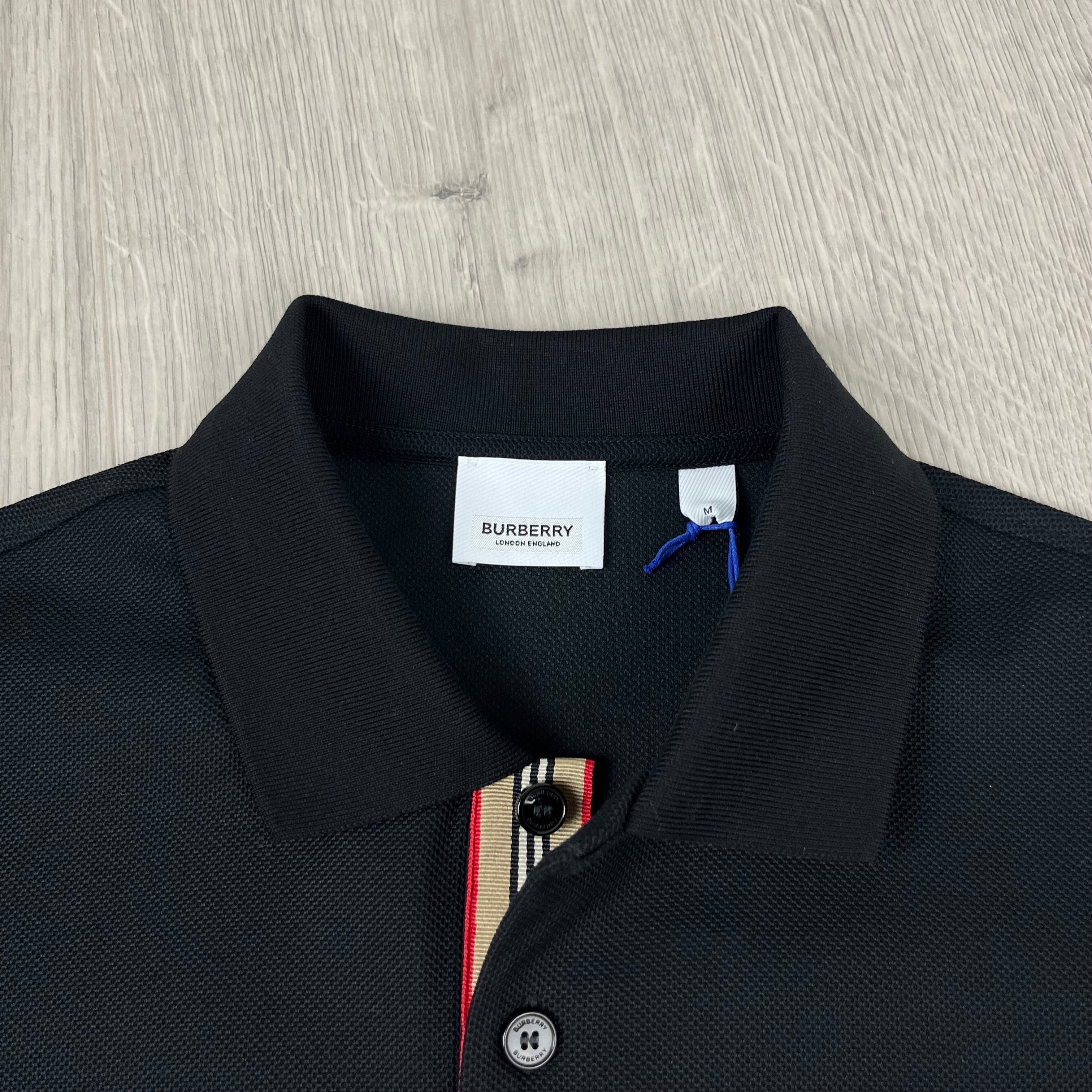 Men's Burberry 'Hartford' Polo Shirt in Black. On sale at Open Attire.