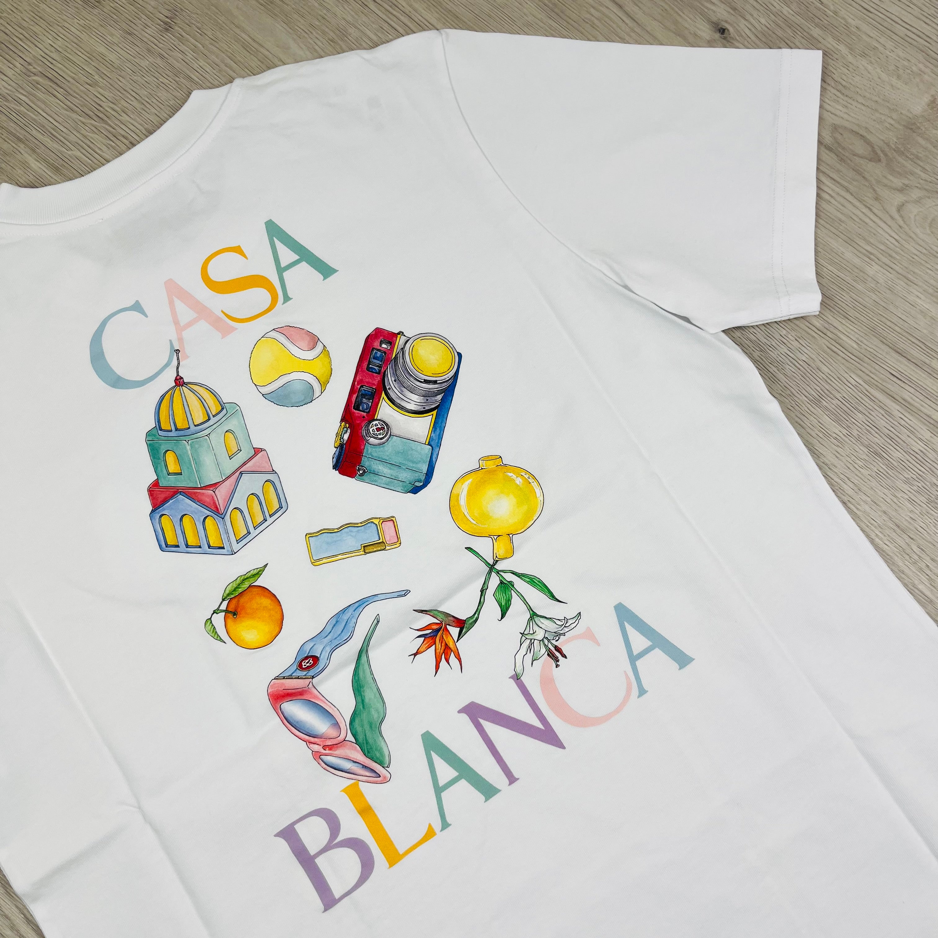 Casablanca Objets en Vrac T-Shirt in White. On sale at Open Attire.