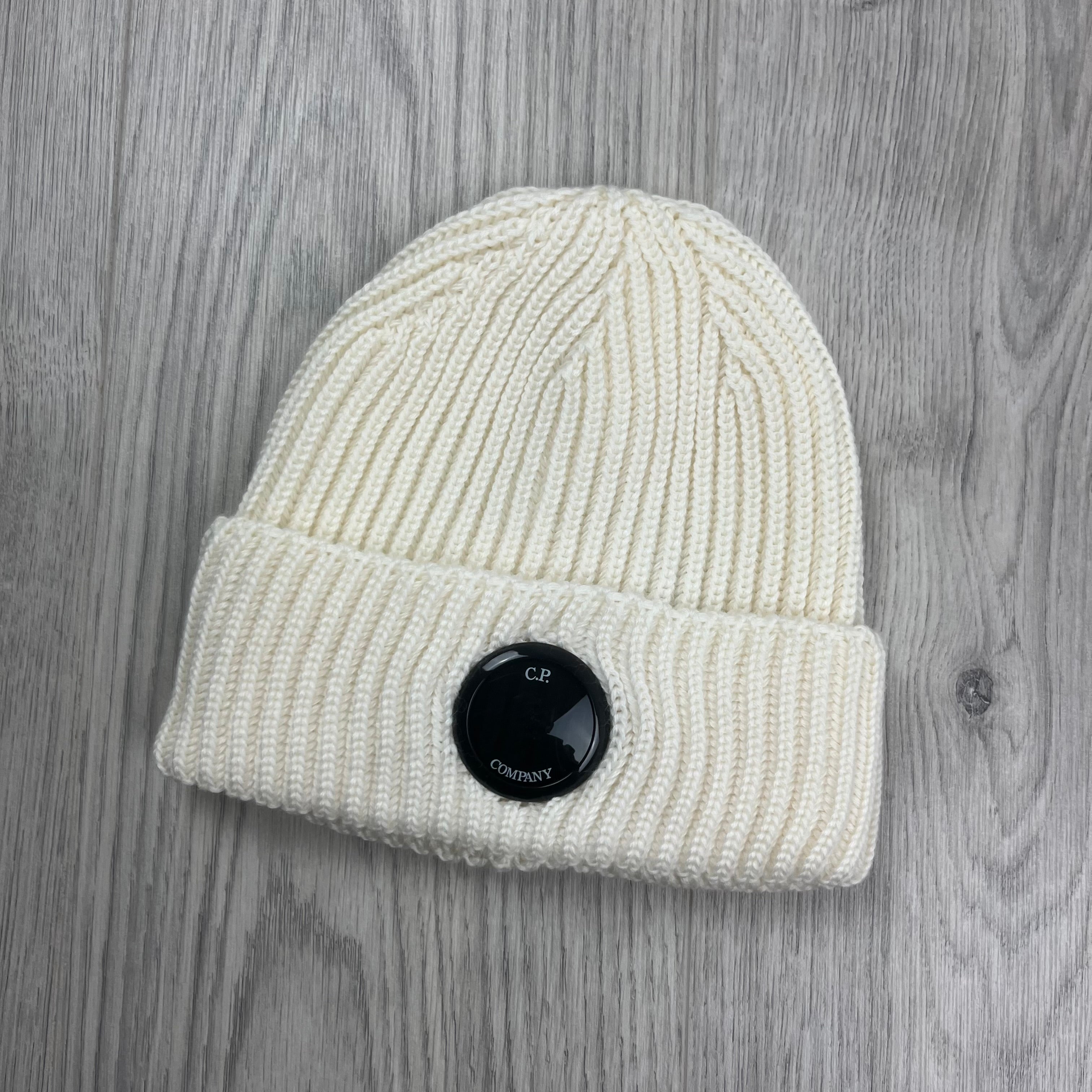 CP Company Merino Wool Lens Beanie in Gauze White. On sale at Open Attire.