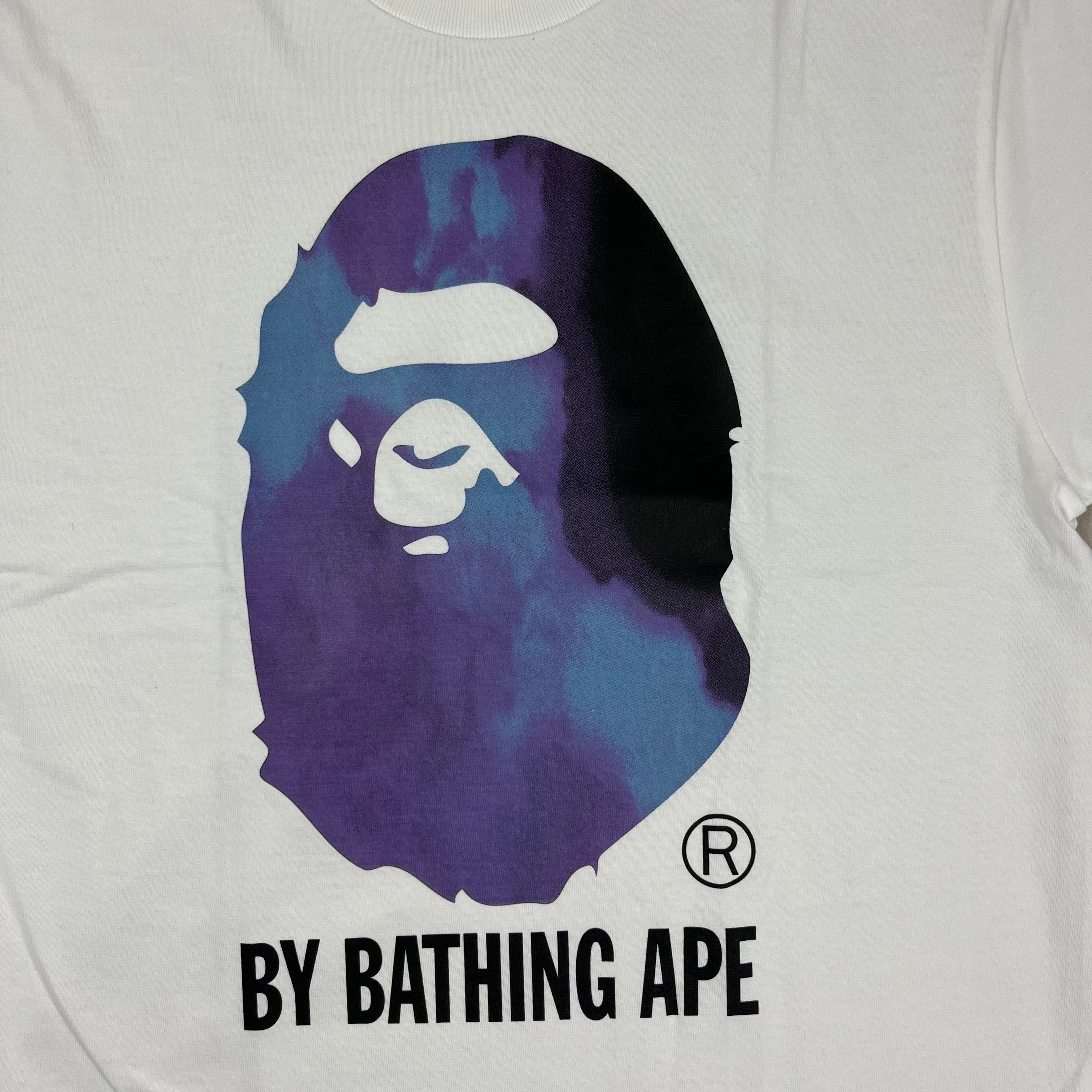 A Bathing Ape 'Ape Head' Tie Dye T-Shirt in White. On sale at Open Attire. 