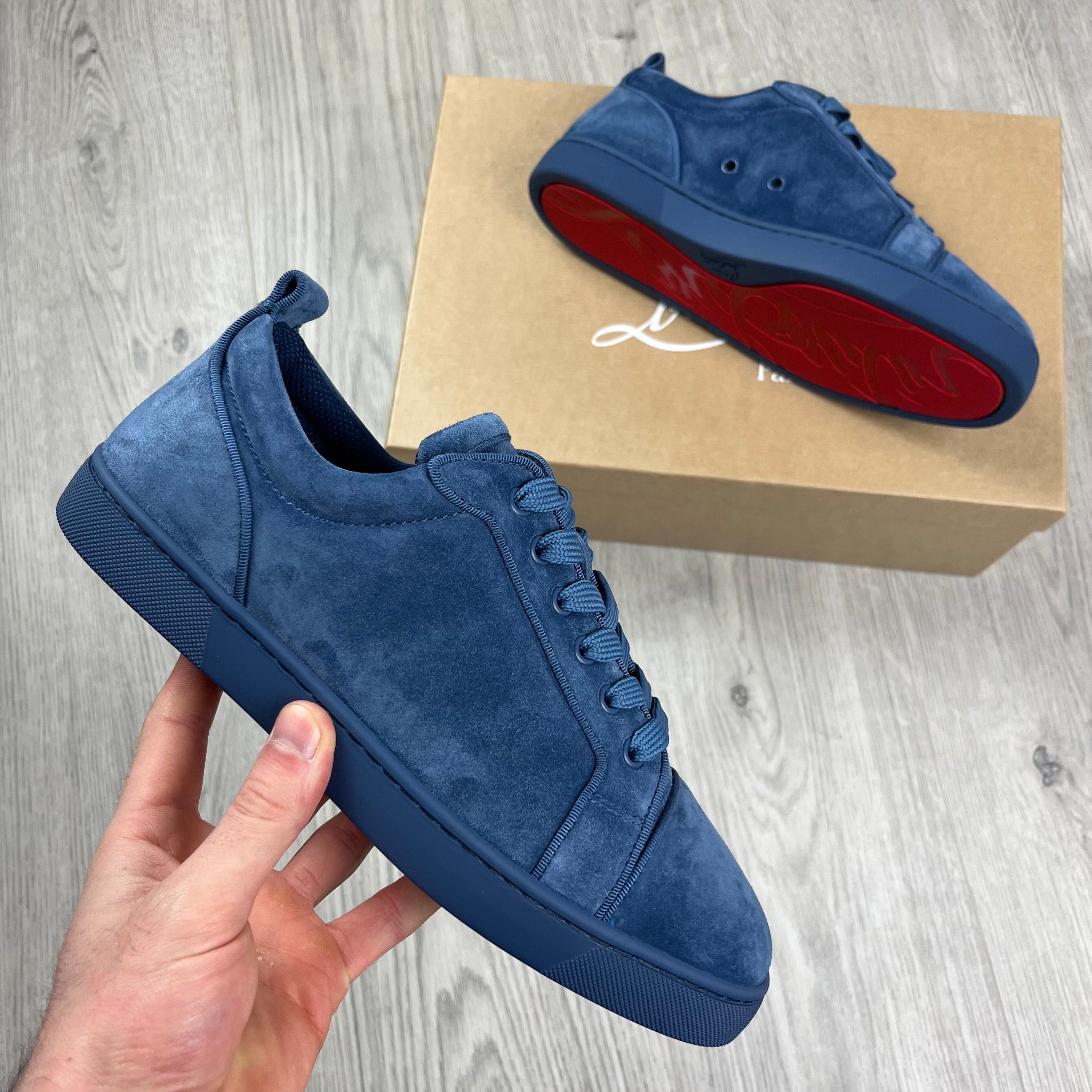 Christian Louboutin Louis Junior Sneakers in Denim Blue. On sale at Open Attire.