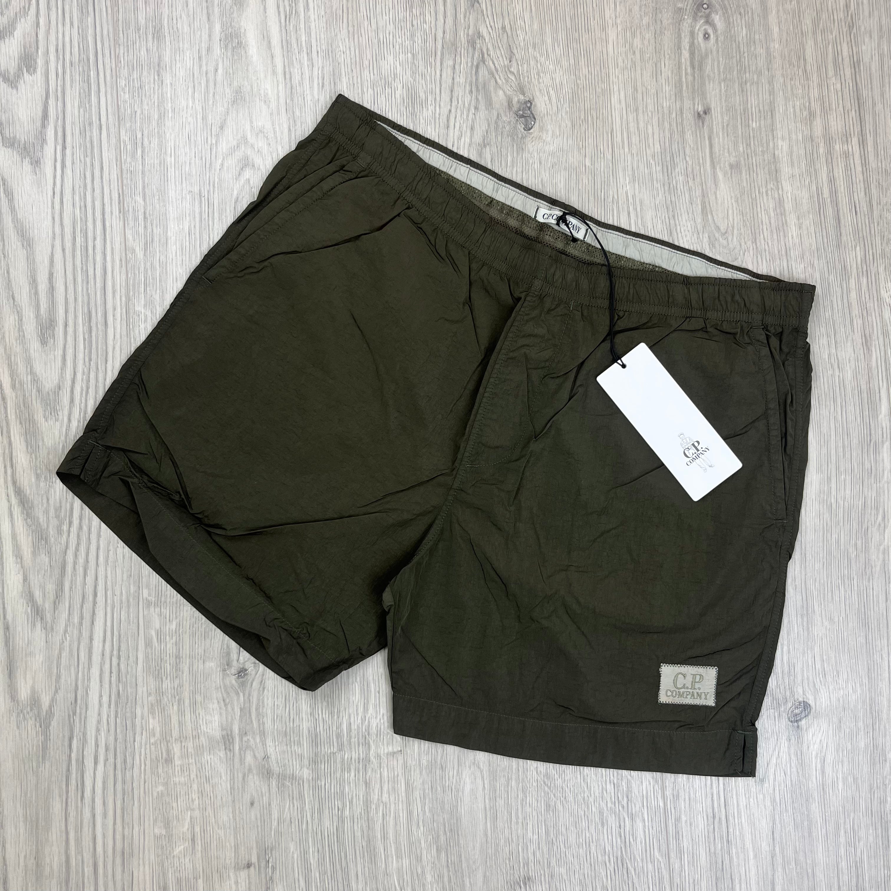 CP Company Eco Chrome-R Swim Shorts in Ivy Green. On sale at Open Attire.