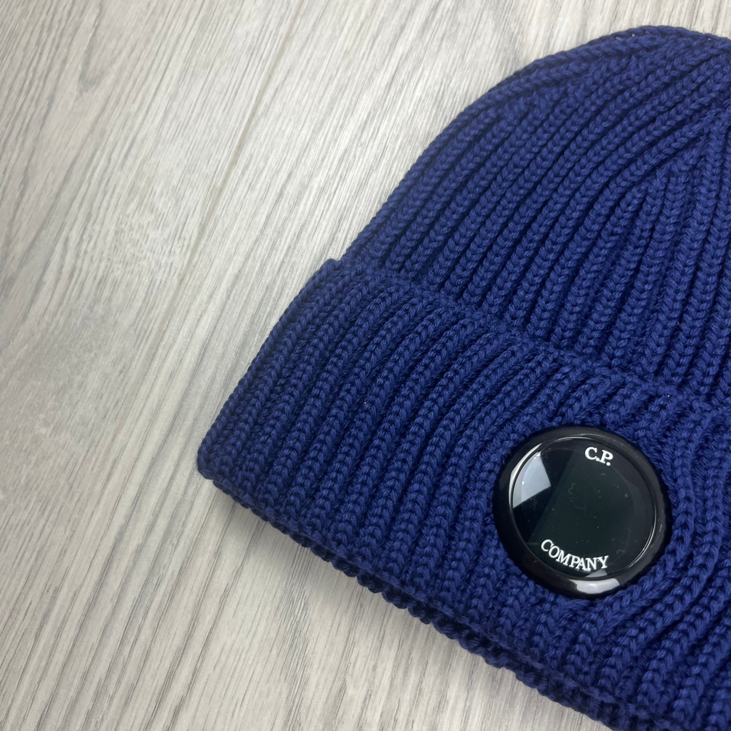 CP Company Merino Wool Lens Beanie in Estate Blue. On sale at Open Attire.