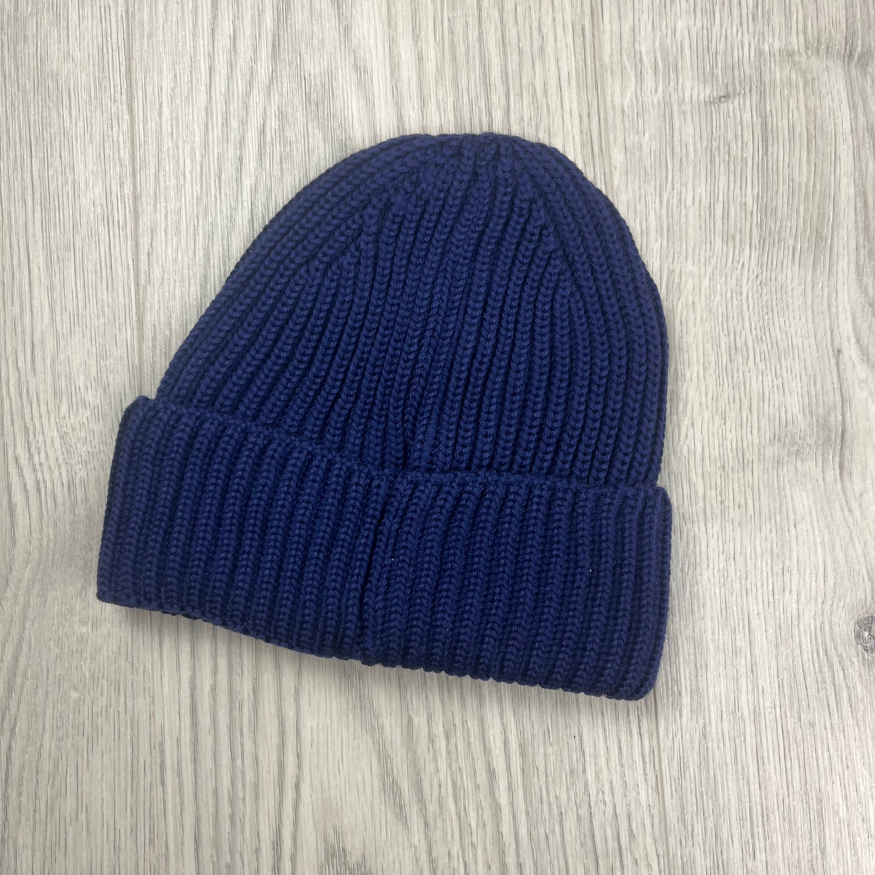 CP Company Merino Wool Lens Beanie in Estate Blue. On sale at Open Attire.