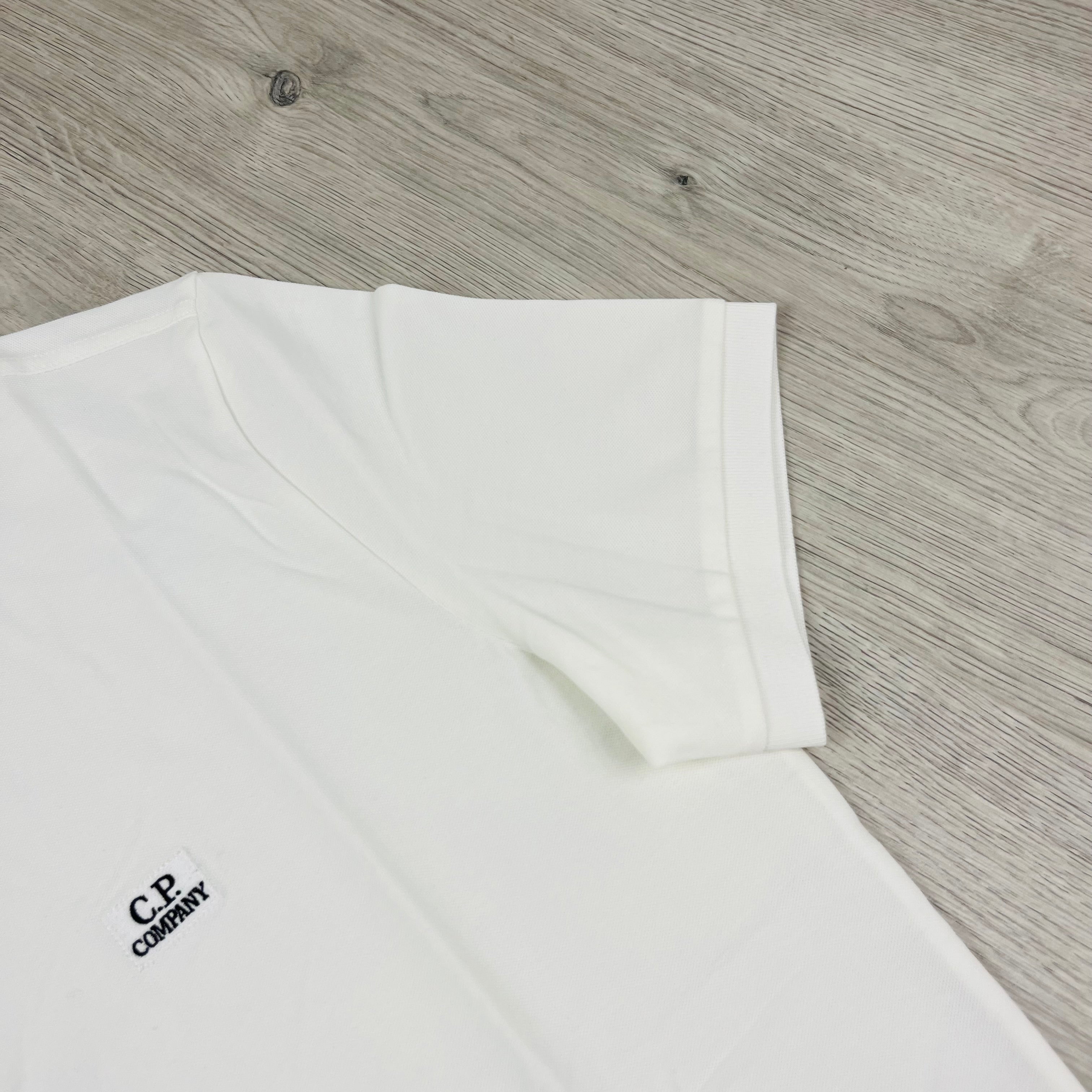 CP Company Polo Shirt in White. On sale at Open Attire.