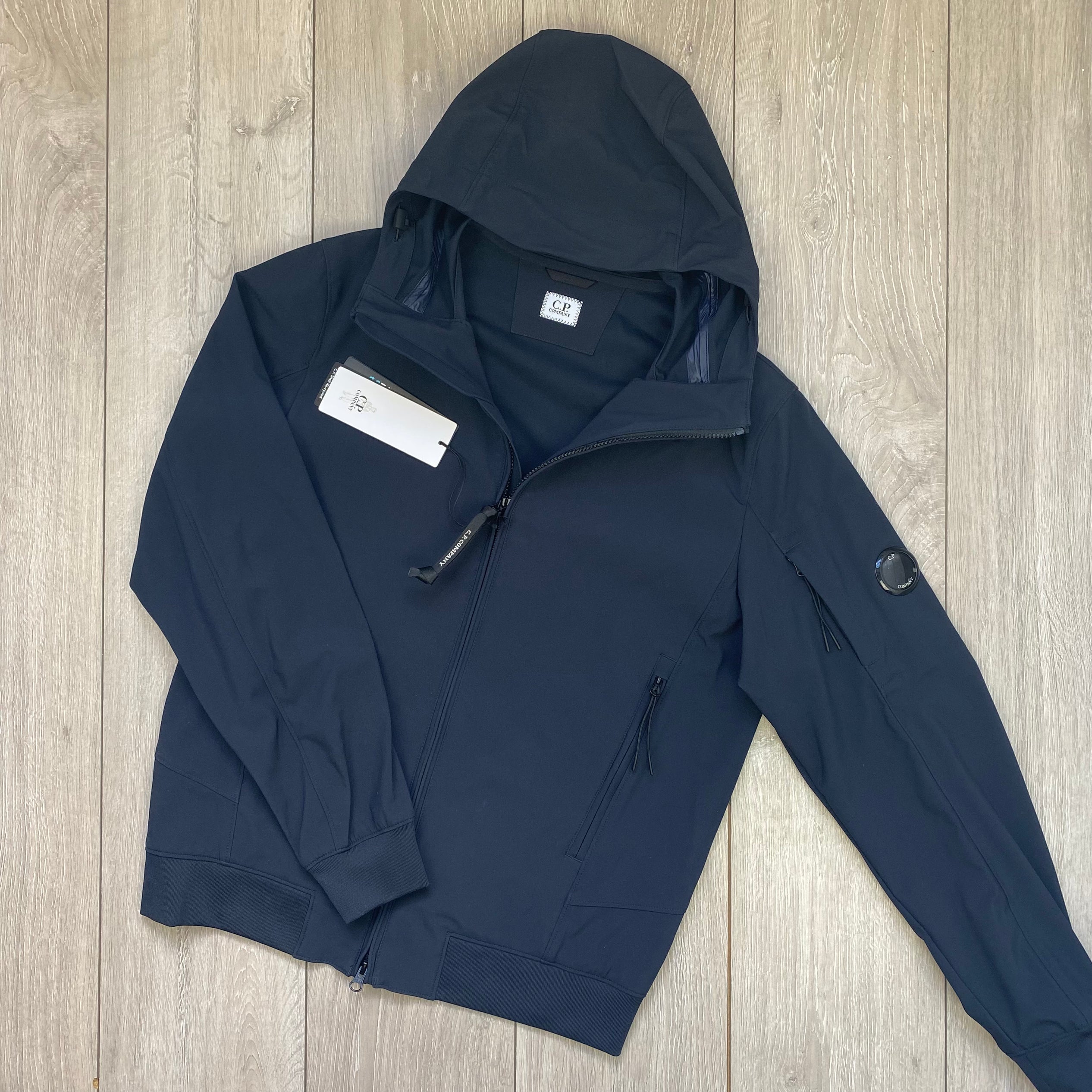 CP Company Shell-R Jacket in Total Eclipse Navy Blue. On sale at Open Attire.