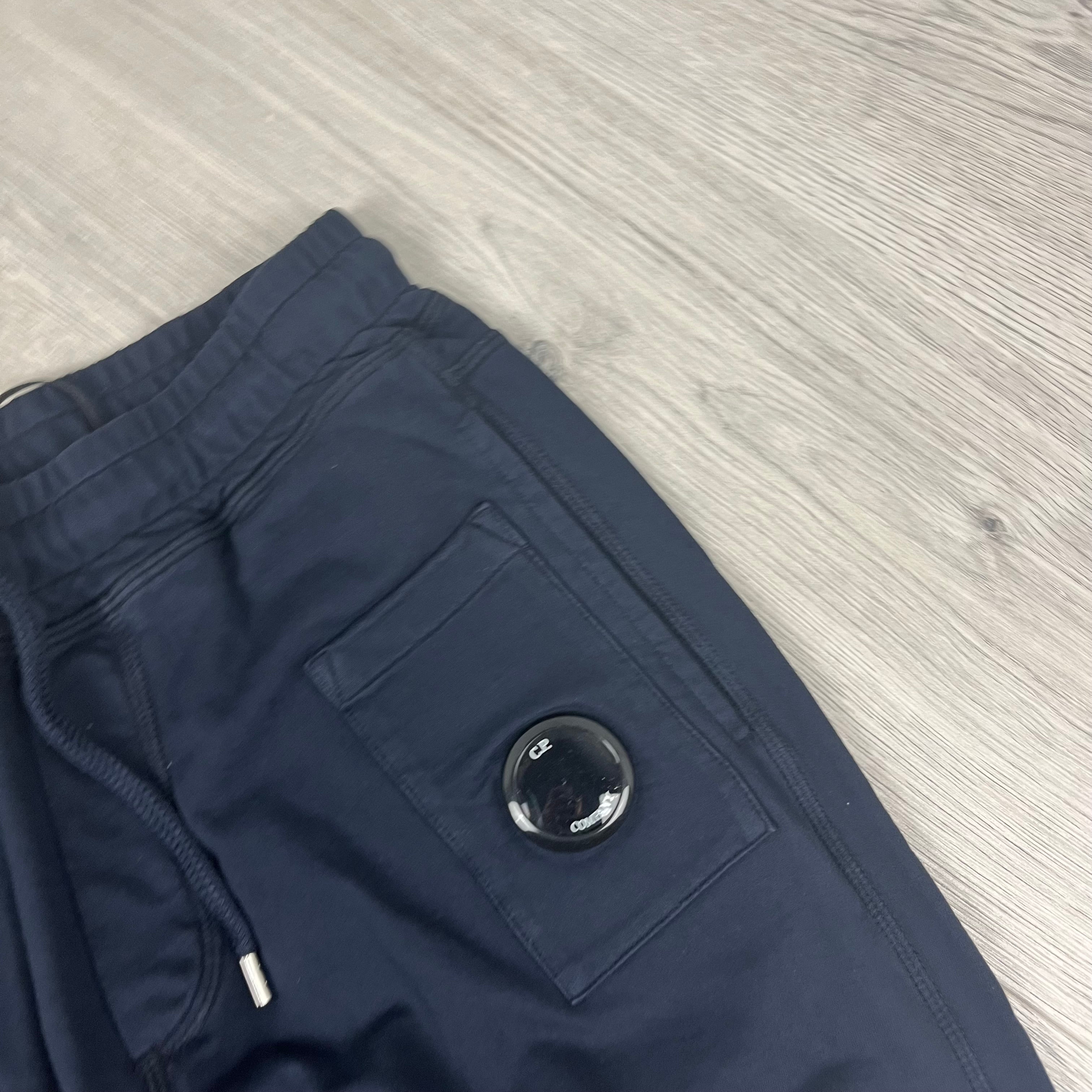 CP Company Utility Sweatpants in Total Eclipse Navy Blue. On sale at Open Attire.