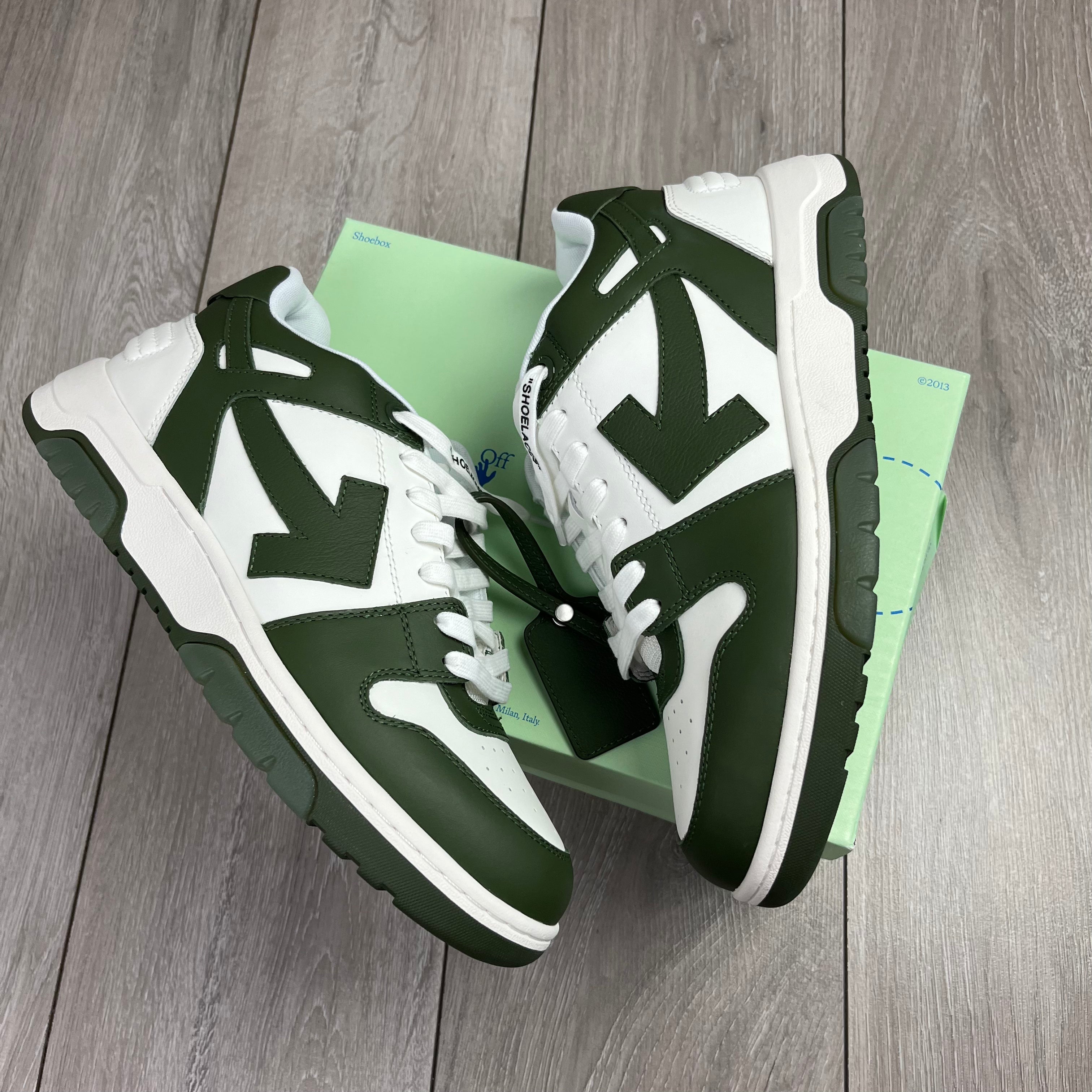 Off-White c/o Virgil Abloh Out of Office Sneakers in white and khaki green. On sale at Open Attire.