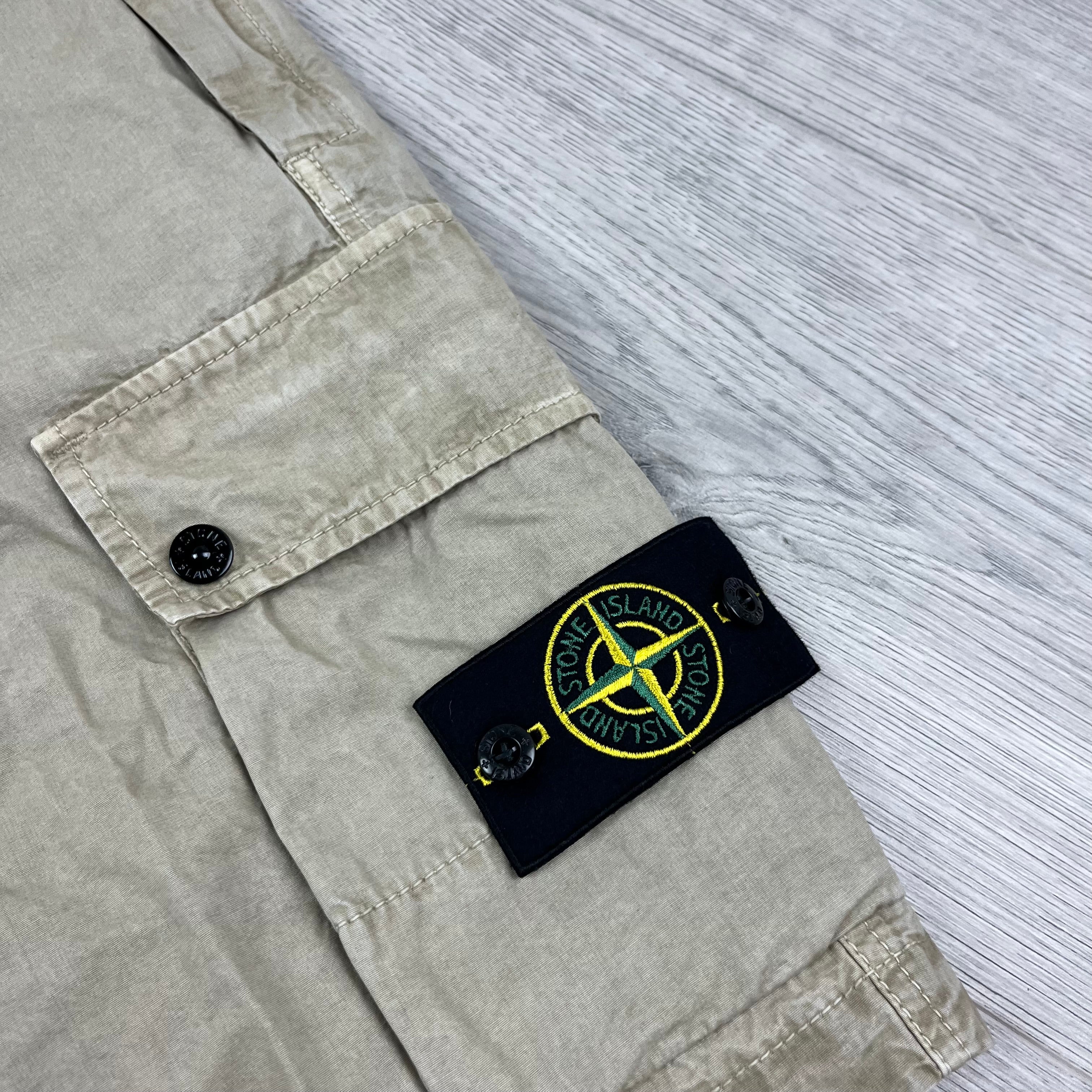 Stone Island Bermuda Cargo Shorts in Desert. On sale at Open Attire.