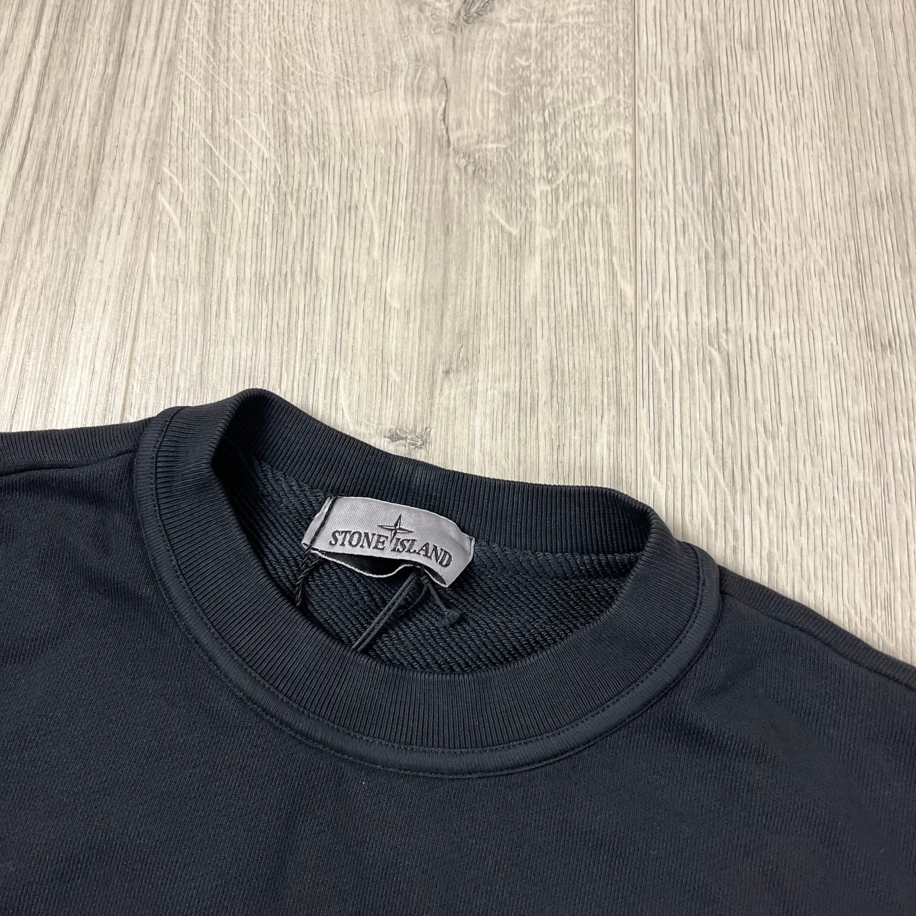 Stone Island 'OLD' Dye Sweatshirt in Black. On sale at Open Attire.