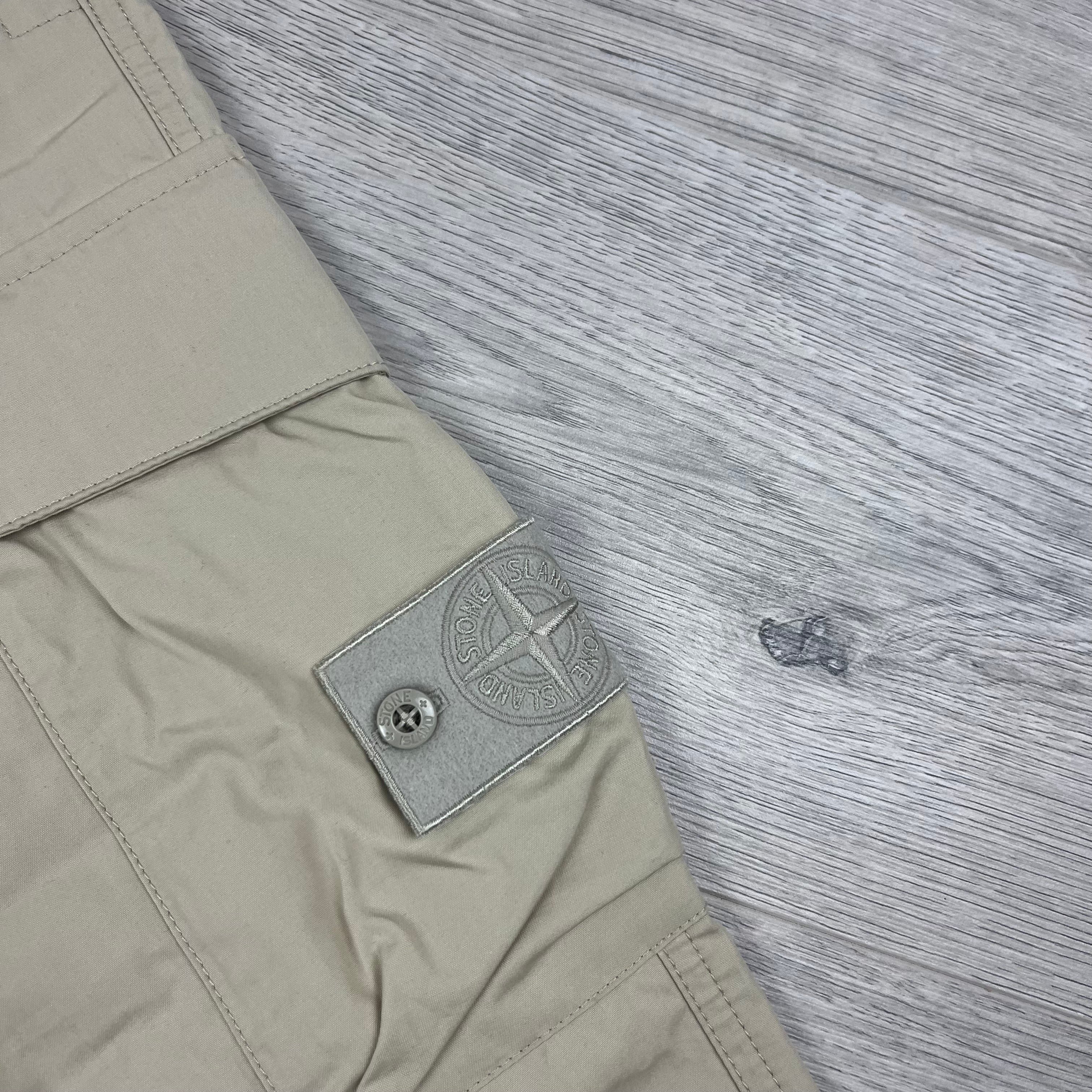 Stone Island Ghost Cargo Trousers in Beige. On sale at Open Attire.