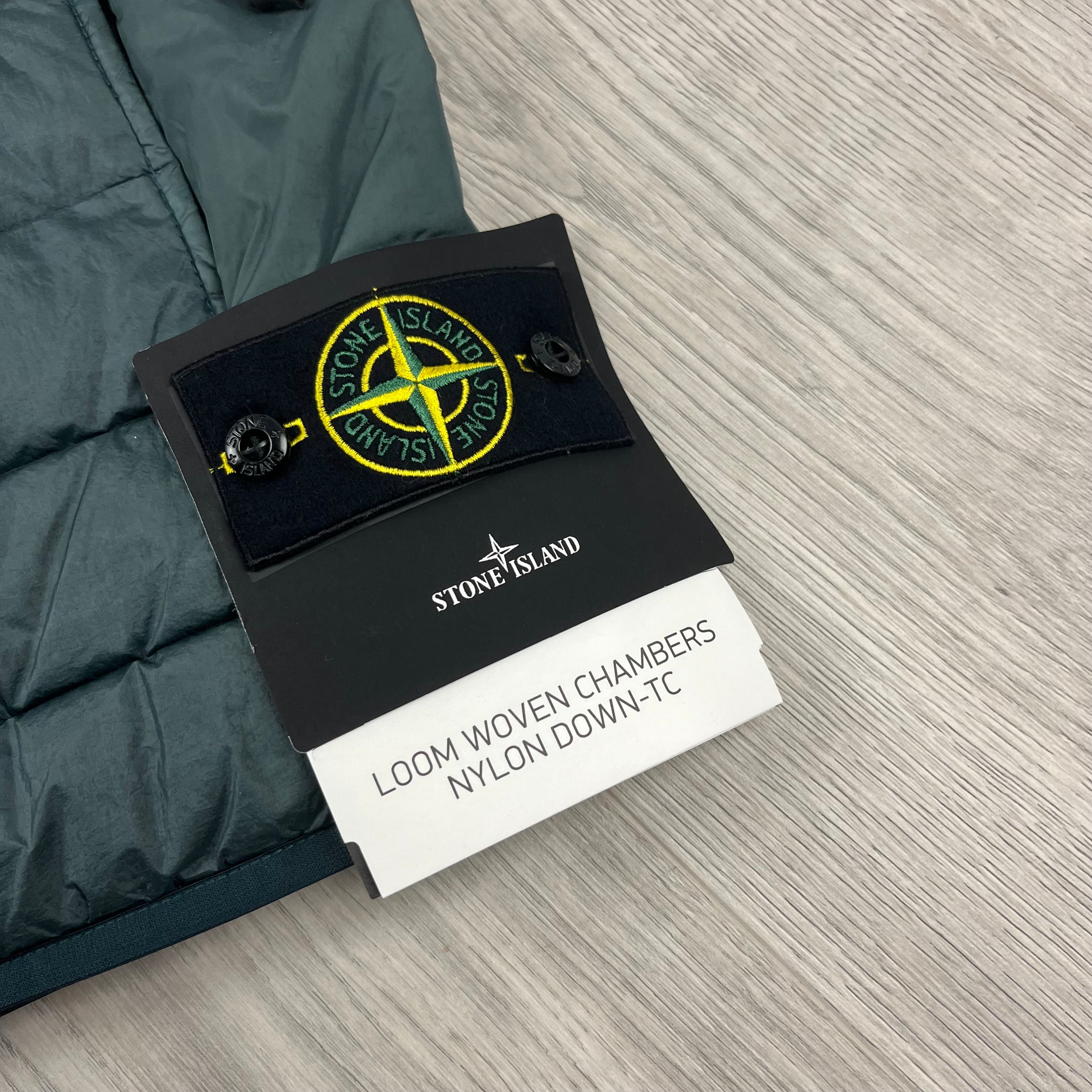 Stone Island Loom Woven Down Gilet in Bottle Green. On sale at Open Attire.