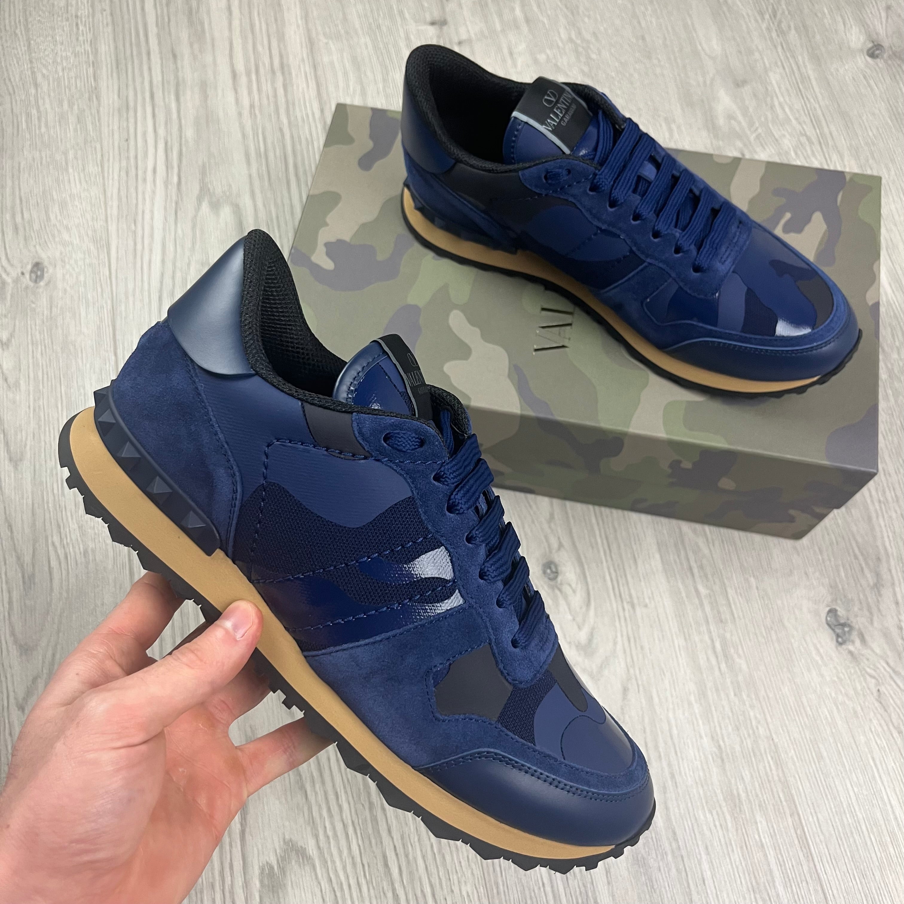 Valentino Garavani Rockrunner Sneakers in Navy Blue. On sale at Open Attire. 