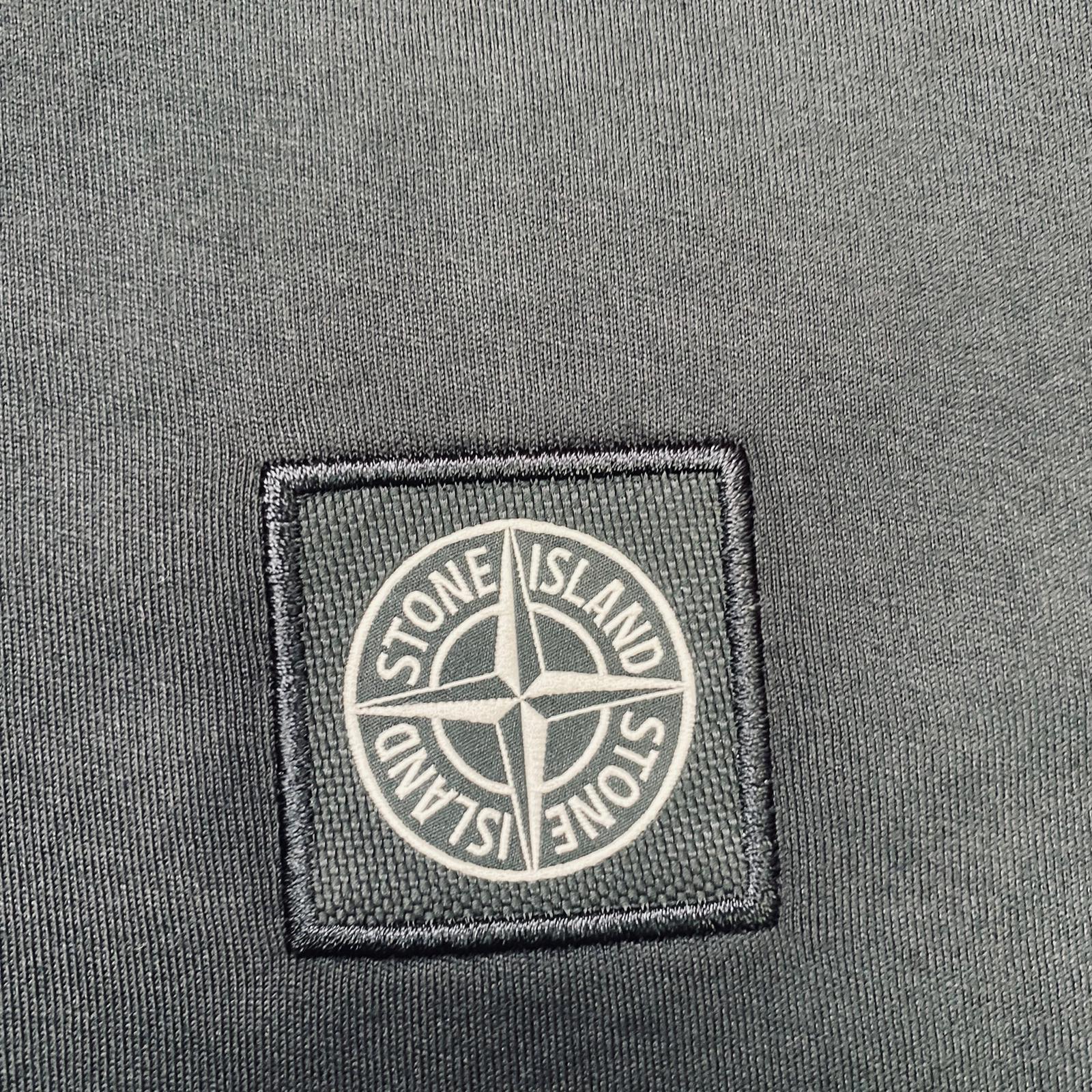 Stone Island 60/2 Patch Logo T-Shirt in Black. On sale at Open Attire.